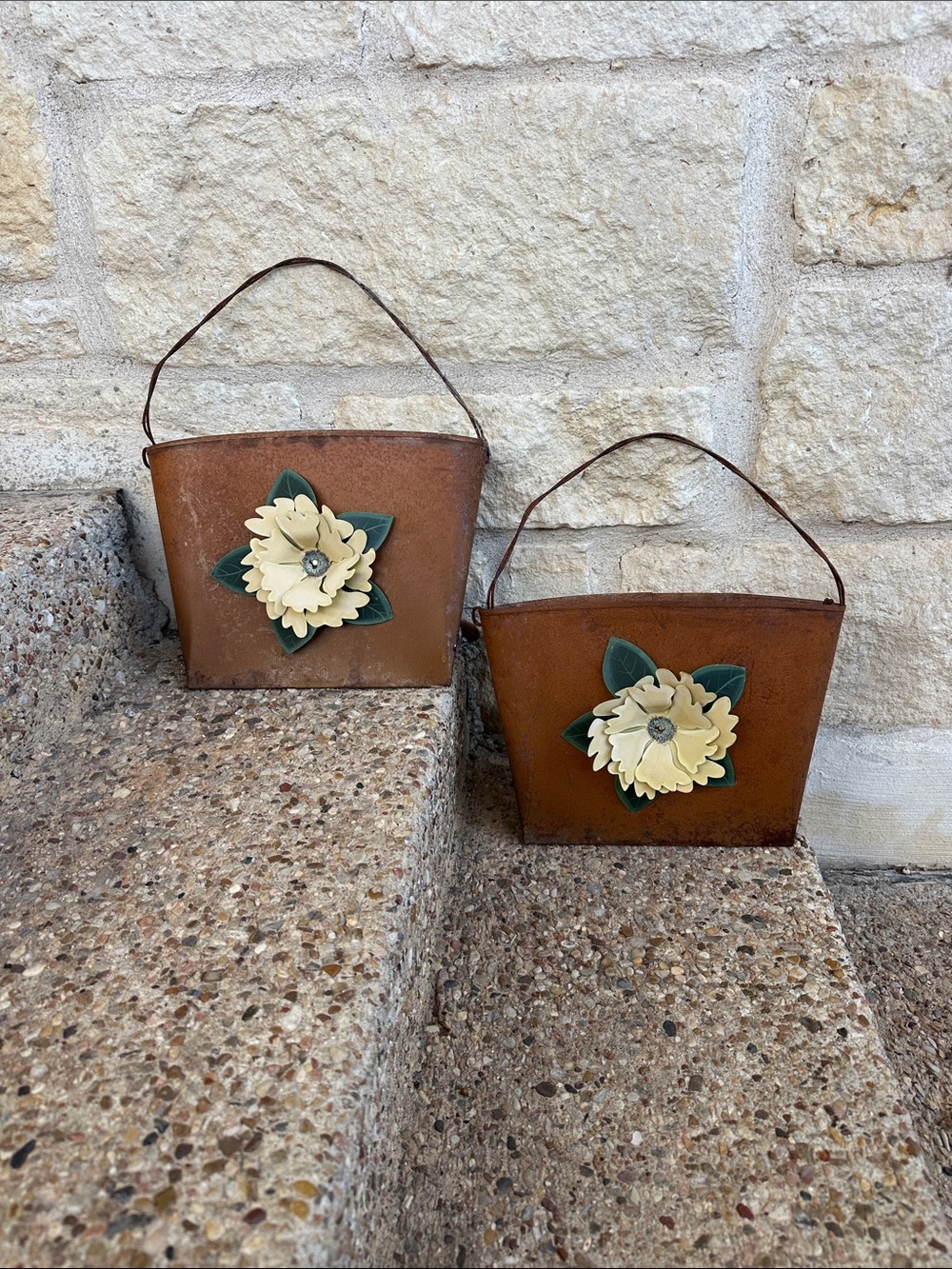 Rust Metal Hanging Planters with Cream Flower Accent